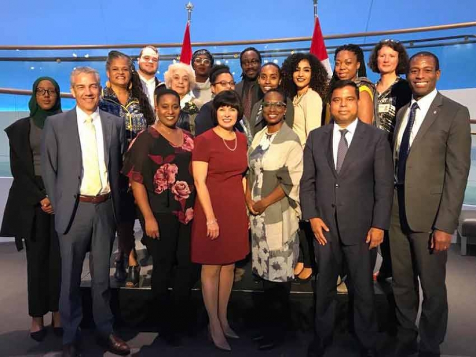 Habon Ali with Canadian Members of Parliament and members of the Public Health Agency of Canada at the launch of the "Mental Health of Black Canadians Fund."