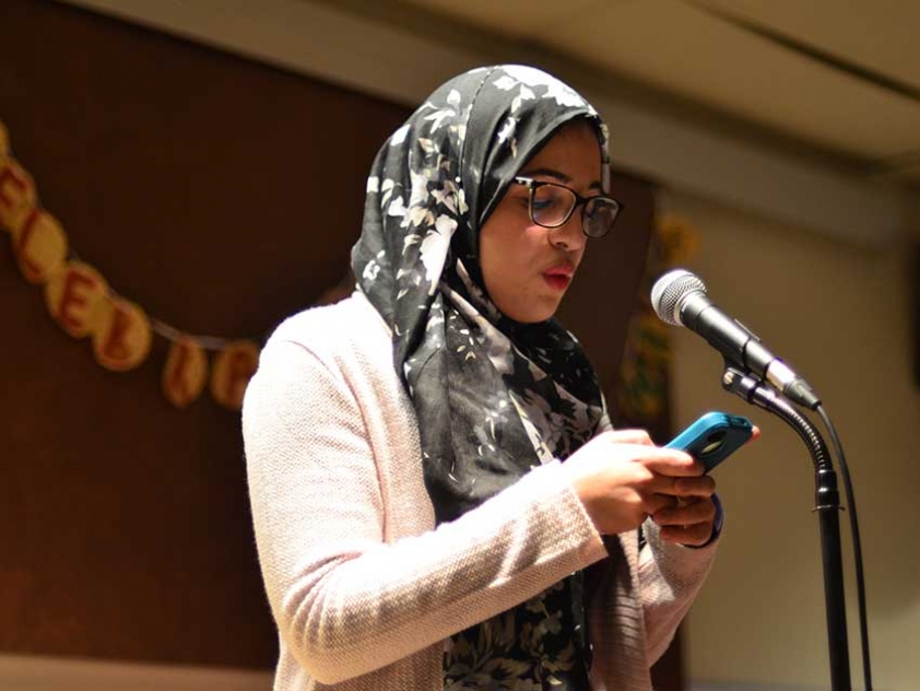 Hidayet Abbad performing her poem at Sanad Collective's Letters to the Beloved Awards Ceremony at the University of Ottawa