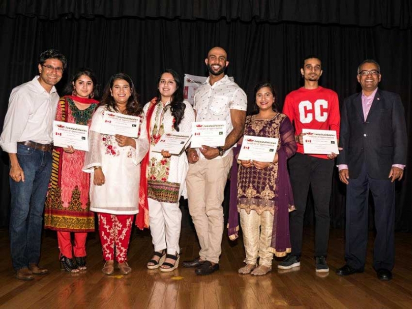 Pakistani Canadian community members receive awards of recognition at the Canada Pakistan Association's Canada Day Celebration in Ottawa.